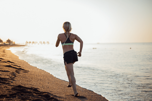 woman running on beach